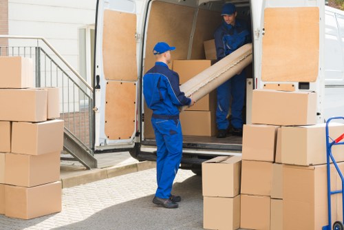 Removal team managing a Cranford house move near local residential streets