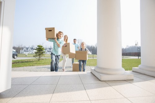 Business removals crew handling equipment during a Cranford office move