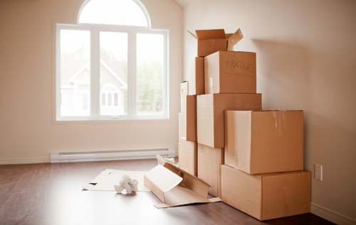 Furniture removals team handling a sofa move in Cranford