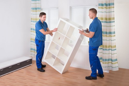 Packed boxes and household items loaded into a removal van