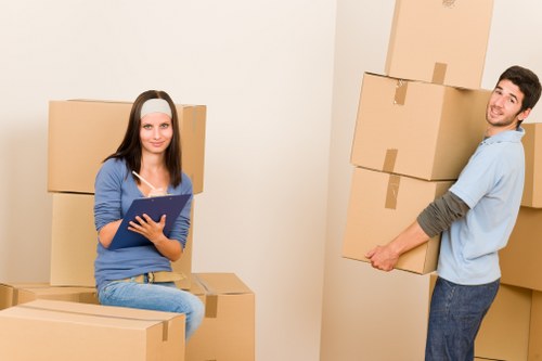 Professional moving truck loading household furniture for a Cranford move